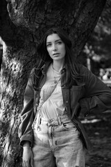 Fototapeta premium black and white portrait of a woman in the park in bulgaria varna, model shooting, autumn 