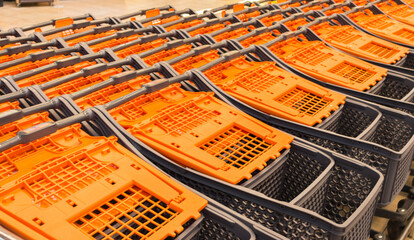 Shopping carts in shopping mall. Marketplace. Stacked shopping carts. Retail place. Shopping...