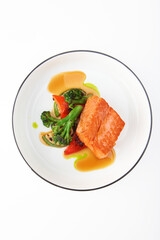 Grilled salmon fillet with vegetables. Healthy food. Healthy breakfast. Grilled vegetables with fish. Isolated object.Copy space.Top view.