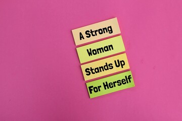 colored paper with the words a strong woman stand up for herself. Inspirational Strong Women Quotes. Woman empowerment