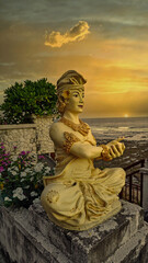 statue of buddha at sunset Bali Indonesia