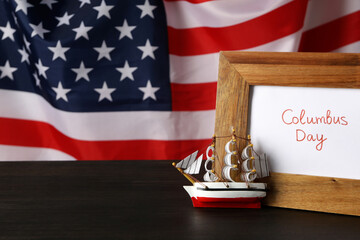 Columbus Day. Wooden frame with the inscription 