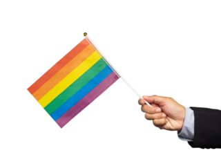 Close-up of a hand holding rainbow flag against a transparent background.
