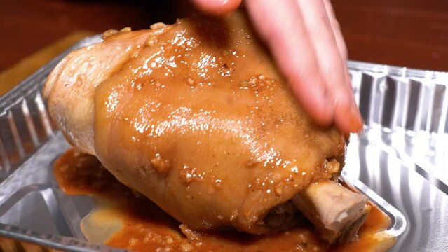 pork knuckle rubbed with spices