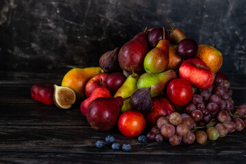 Still life of fruits on a black background, Harvest Festival, Thanksgiving