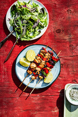 Chiken kebab grilled maet with salad and lime in the gardenparty - 644003612
