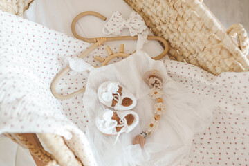 Outfit for a newborn in a baby cradle, concept in anticipation