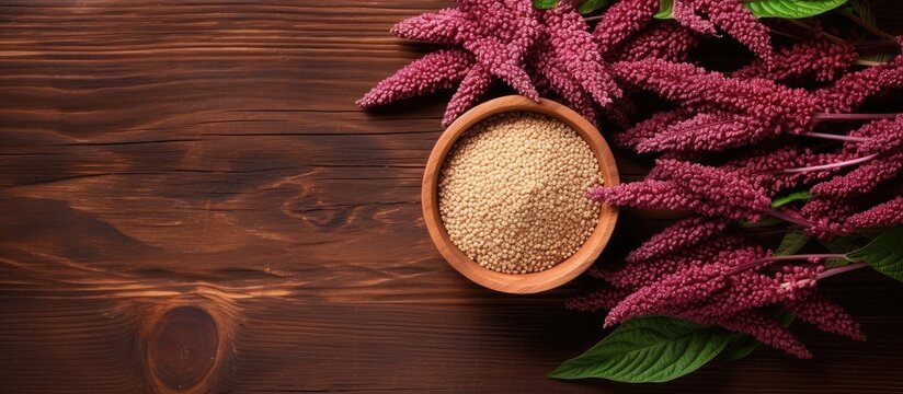 Healthy food Amaranth seeds in bowl made of wood isolated pastel background Copy space
