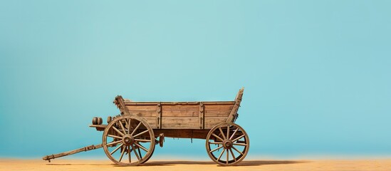 Antique carriage on a isolated pastel background Copy space - obrazy, fototapety, plakaty