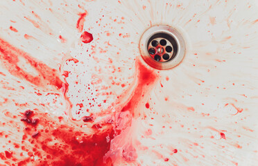Fresh red blood splat on white porcelain with specks from the impact. Copy space area for horror themed concepts and ideas. © Евгений Вершинин