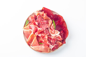 Obraz premium Charcuterie board. Antipasti appetizers of meat platter with salami, prosciutto crudo or jamon and olives. 