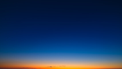 Color gradient on the sky. Sky with clouds during sunset. Clouds and blue sky. Photo for design and background.