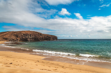 Serene Beauty: Lanzarote's Rocky Coastline by the Sea