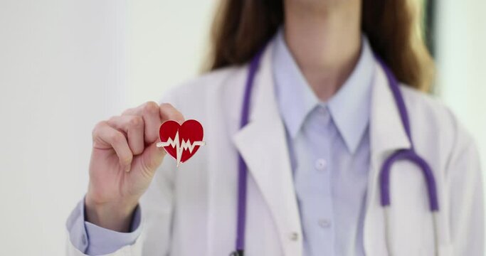 Stethoscope and heart icon in hands of cardiologist doctor. Cardiologist consultation