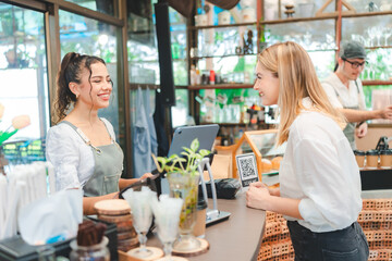 Happy smile waitress standing at restaurant, Young professional business woman attend new customers...