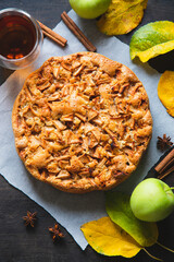 Apple pie with cinnamon. Charlotte, a sweet dessert made from apples baked in dough