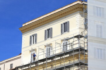 Fototapeta na wymiar Piazza Mignanelli Square Building Facade During Renovation Works in Rome, Italy