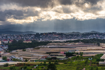 Fototapeta premium Vegetable field and Housein plateau, Da Lat, Vietnam in sunset.