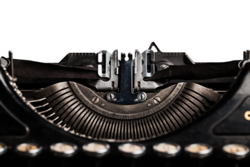 Typewriter typing on a paper