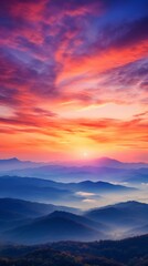 Fototapeta premium A colorful sunset over a mountain range