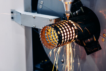 Macro CNC laser machine cutting sheet metal with light spark. Technology plasma industrial banner,...
