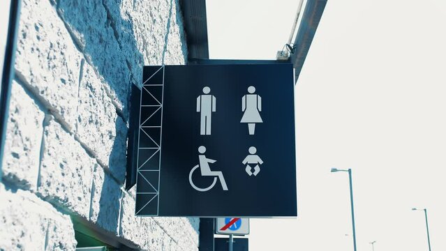 Toilet sign. Pointer wc. handicap toilet sign. Toilet sign in shopping mall . sign. pointer. signpost . toilet or WC. Signboard toilet sign.