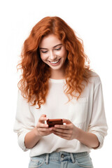 Beautiful red-haired smiling woman uses a mobile phone on a white background
