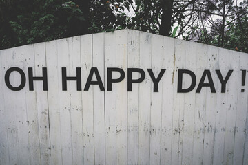 Inscription Oh Happy Day with on old wooden background. Vintage style