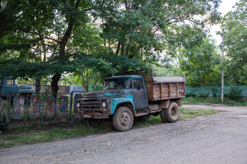 Old, rusted Vehicle on the road. post soviet country