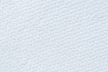 A sheet of clean structured white tissue paper as background