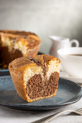 Marble cake and cup of coffee on the table.
