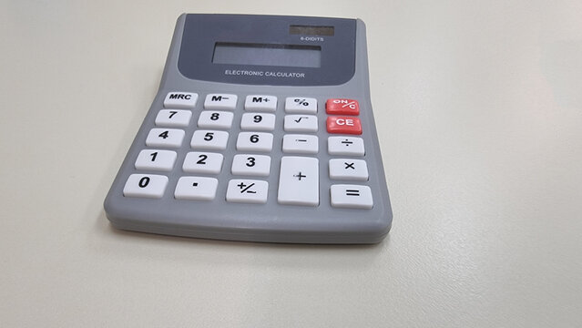 calculator electronic computer pocket on empty background buttons