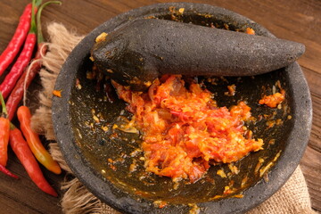 sambal bawang is a typical Indonesian flavoring food or condiment from the island of Java. Sambal Bawang is made from red chilies, cayenne pepper, garlic, salt. Indonesian food.