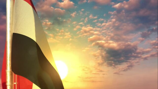 Yemen waving flag on beautiful sunset background