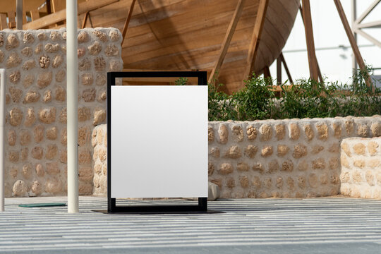 Blank signboard mockup in the urban environment, empty space to display your advertising or branding campaign