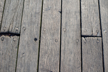 pavement made of very old wooden planks texture