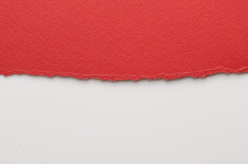 Art collage of pieces of ripped paper with torn edges. Sticky notes collection red white colors, shreds of notebook pages. Abstract background.