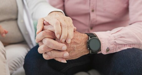 Closeup of old couple, man and woman holding hands for love, care and trust in retirement. Senior...