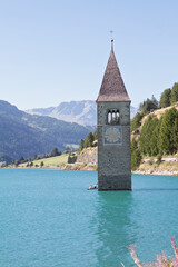 The tower of a flooded church. Reschensee