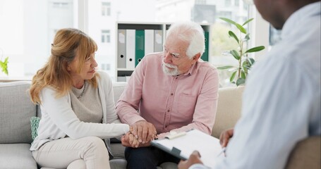 Counseling, support and senior couple with therapist in consultation for help, talk or crisis guidance. Therapy, depression and old people holding hands consulting marriage or mental health expert