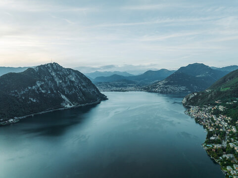 Aerial view of Lugano lake at sunset, Melide, Ticino, Switzerland.