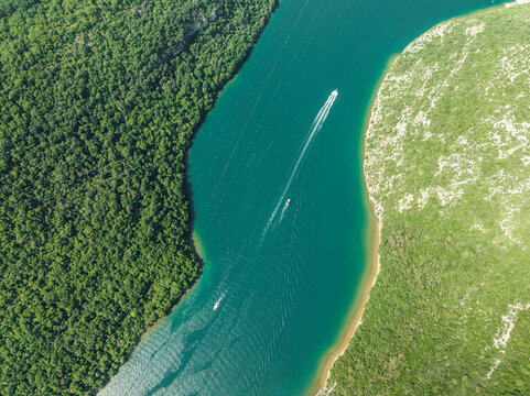 Aerial view of boats sailing along the Limski Fjord (Canal di Leme) in Sveti Lovrec, Istria, Croatia.