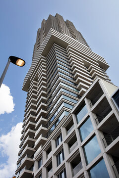 Exterior of the Cooltoren in Rotterdam and a led streetlight