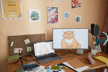 Background image of kids desk with school supplies and digital art on computer screen , copy space