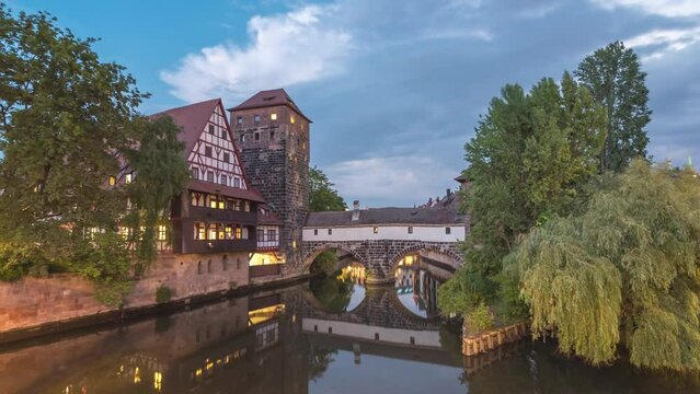 Nuremberg (Nurnberg) Germany time lapse 4K, city skyline day to night timelapse at Wasserturm and Pegnitz River view from Max Bridge