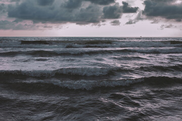 Beautiful sea with waves and cloudy sky