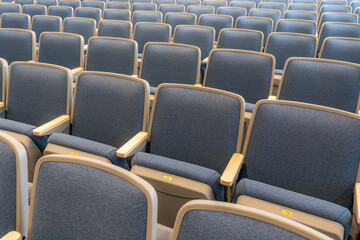 Fototapeta premium Empty gray and blue theater, auditorium seats, chairs. 