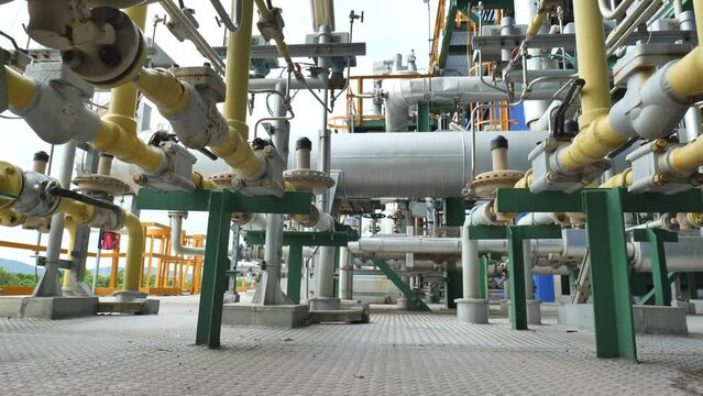 Modern engineering and technology structure of the chemical plant encompasses equipment, measuring instruments, chemical pipeline, and various other contemporary technological and industrial concepts.