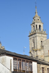 Historical Allure: Cathedral Tower and Small Vintage Balcony