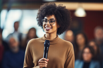 An impassioned young African American woman engages in public speaking, conveying strong emotions to her audience. - obrazy, fototapety, plakaty